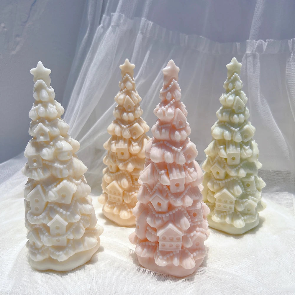 Four birdhouse ornament trees with small star tops