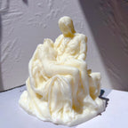 Cream Pietà-style casting viewed from the front
