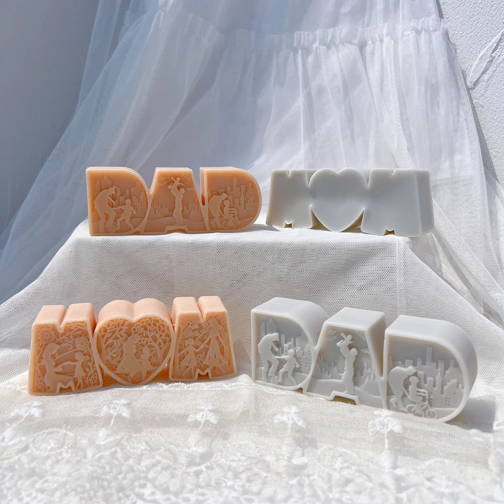 Plain rear of MOM casting beside relief-front DAD and MOM figures