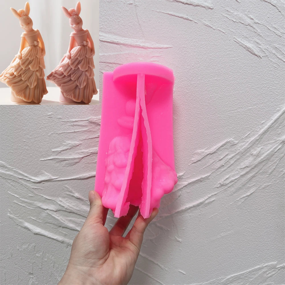 Pink silicone rabbit-in-gown mold with matching examples