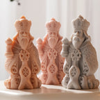Three bearded chess figure castings with ornate robes