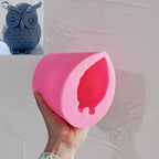 Pink silicone owl mold with visible bird cavity
