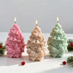 Pink, peach and green festive pinecone candle examples