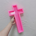 Pink silicone mold for straight-armed cross design