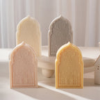 Four arched plaques showing fine mosque facade relief