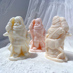 Santa candle figures showing shoulder sacks from front and back