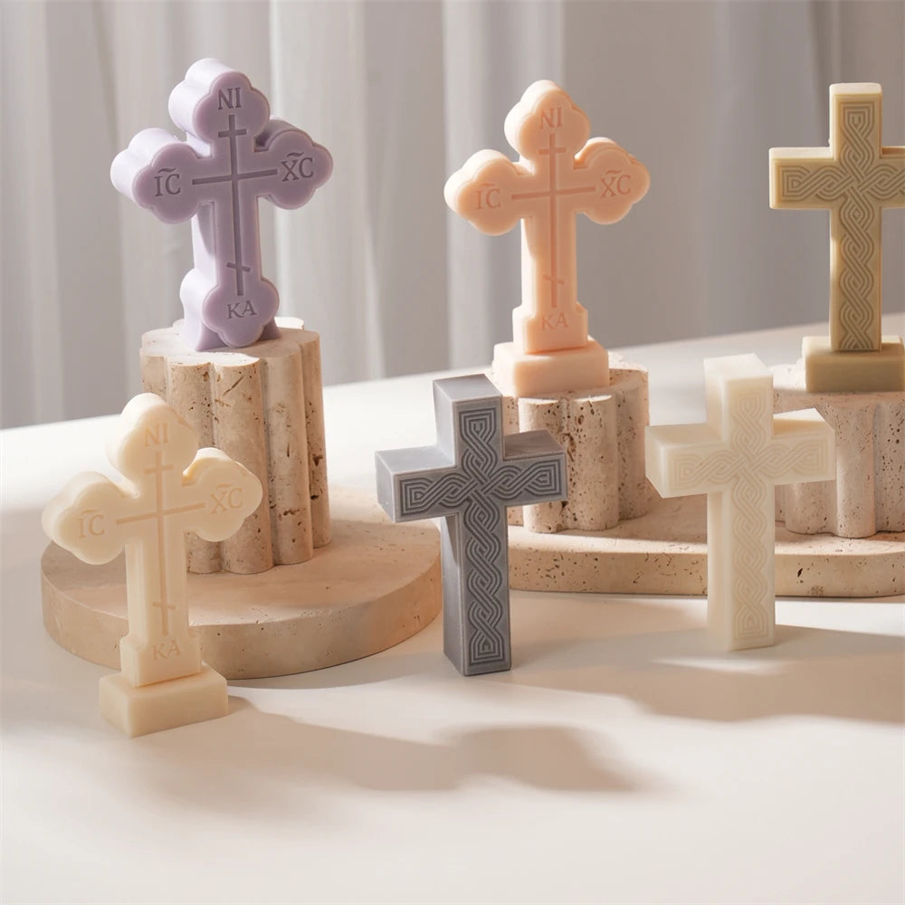 Cross candle samples arranged on wooden display blocks
