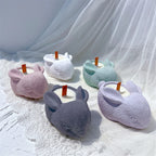 Several bunny-shaped decorative vessels with sculpted fur