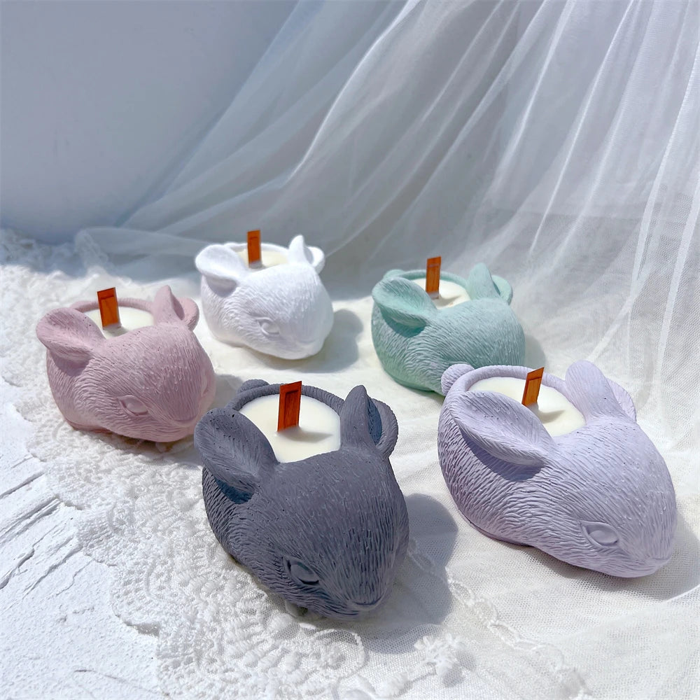Several bunny-shaped decorative vessels with sculpted fur