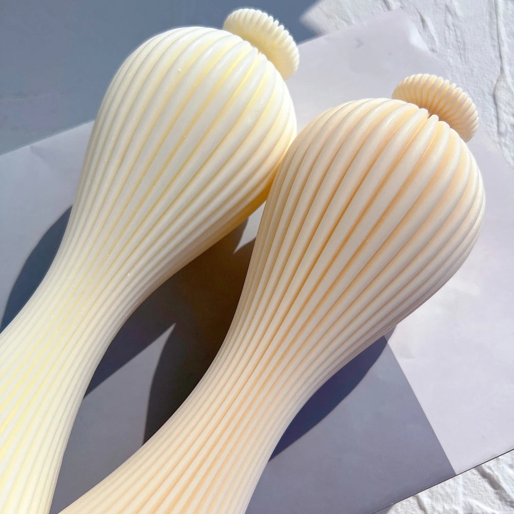 Close view of ribbed shoulders and top details on tall castings