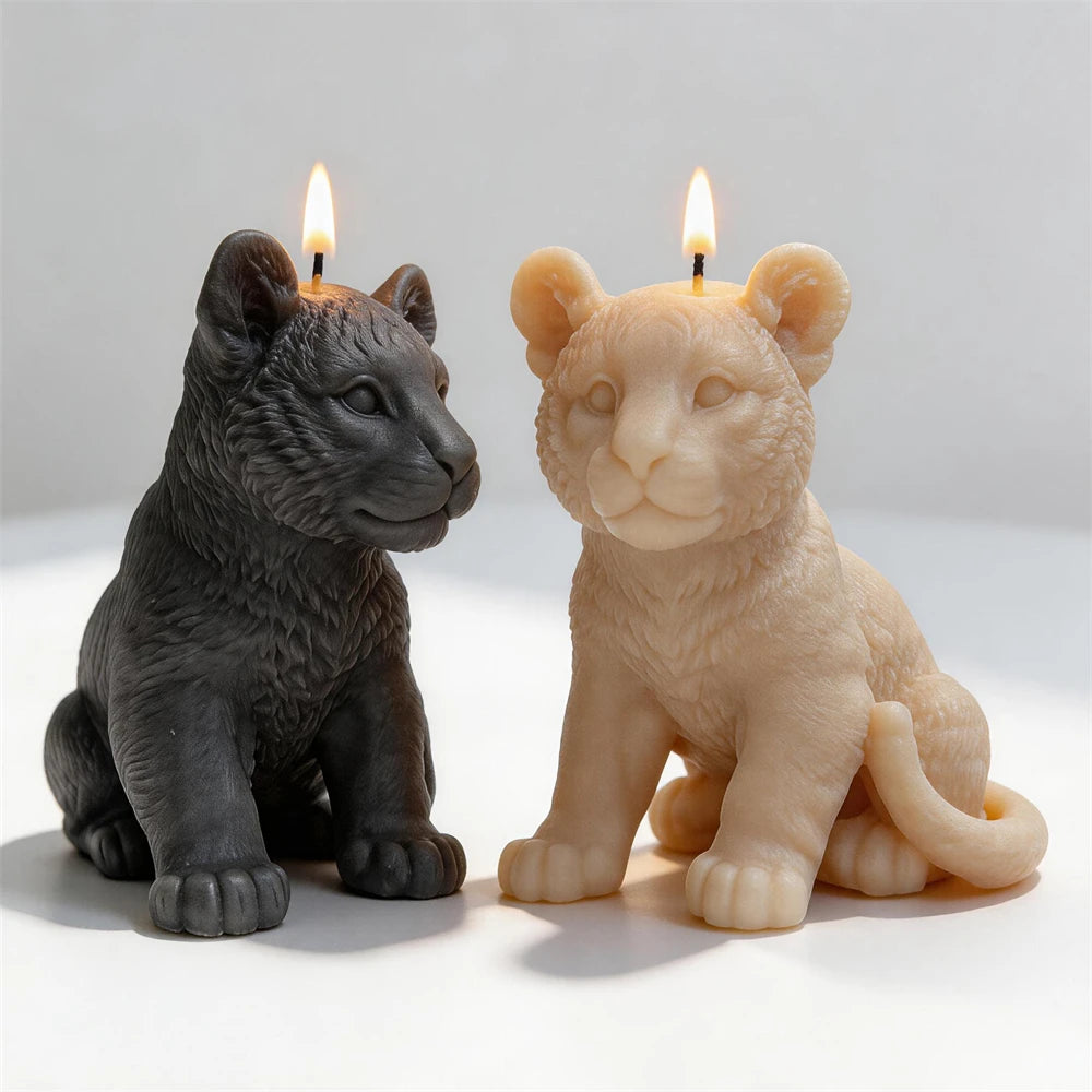 Dark and cream seated tiger cub candle samples with rounded ears