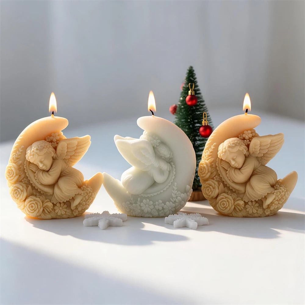 Angel resting on moon candle castings with feather relief