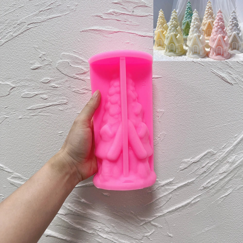 Pink silicone tree cottage mold beside example castings