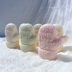 Patterned mittens in several pastel casting colors