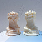 Two ornate Rook tower castings