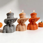 Gray, cream and orange skeleton candle busts with exposed ribs and jacket lapels