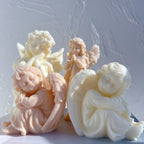 Angled seated cherub and standing angel castings showing wing detail