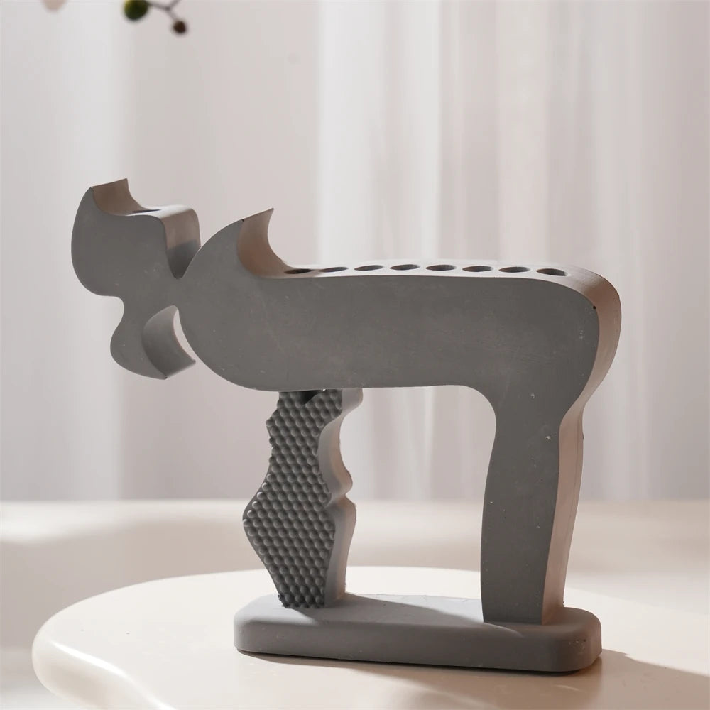 Gray Chai-inspired multi-candle holder casting with row of candle holes