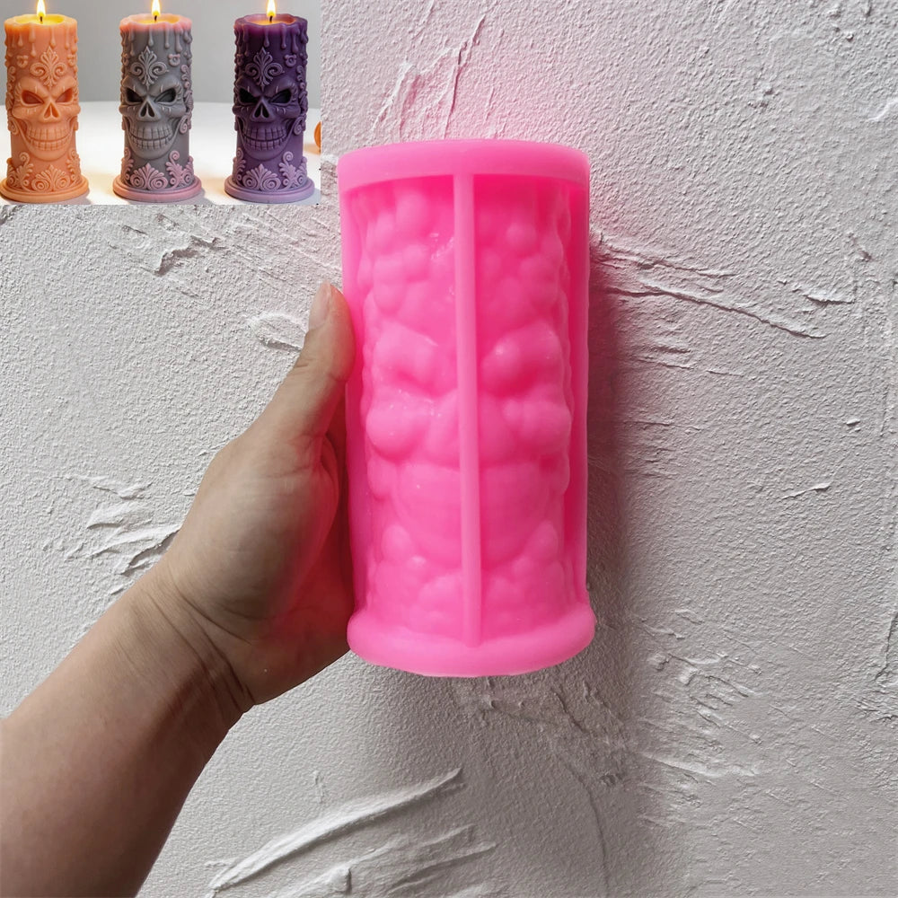 Pink ornate skull pillar silicone mold held in one hand