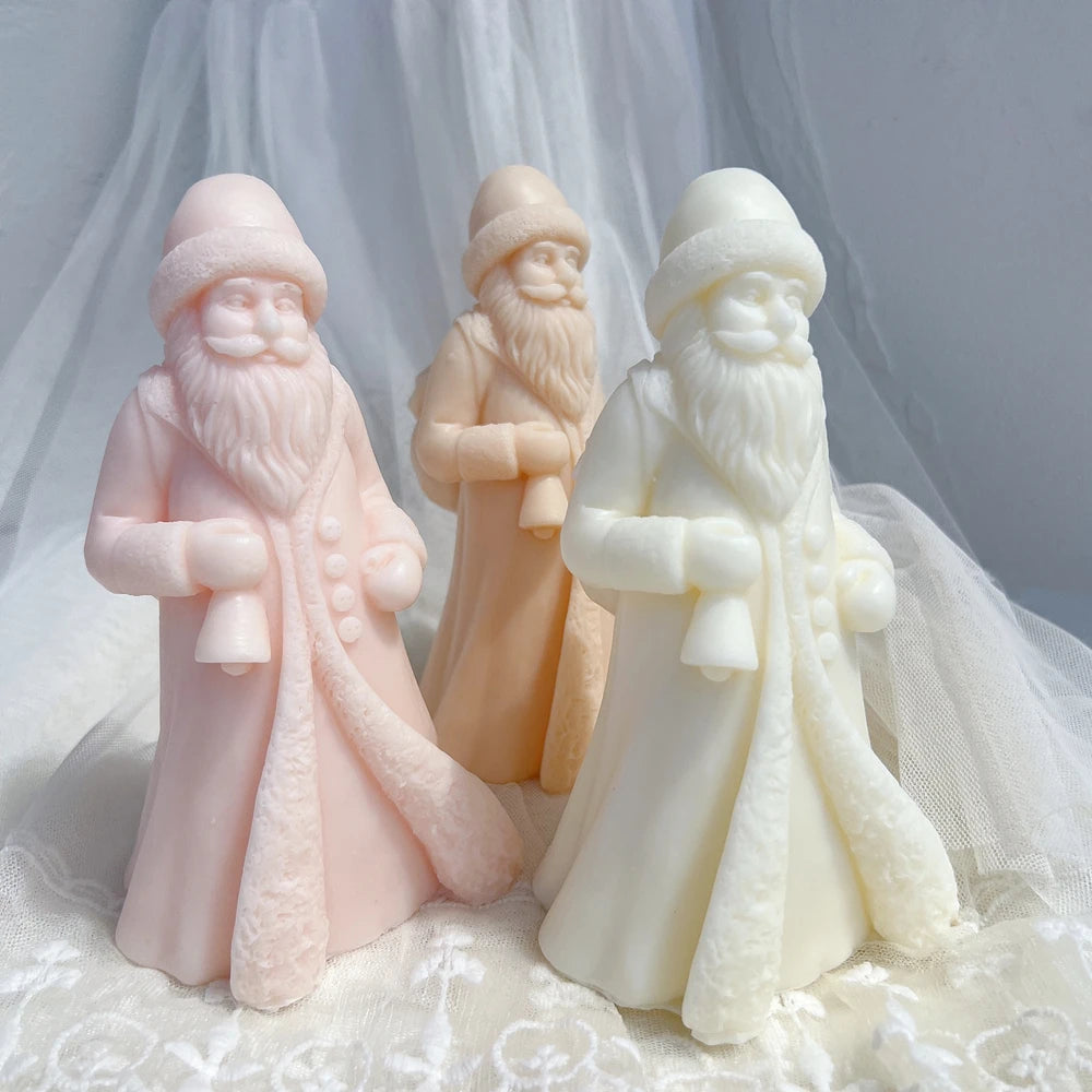 Front view of buttoned-coat Santa figures with long beards