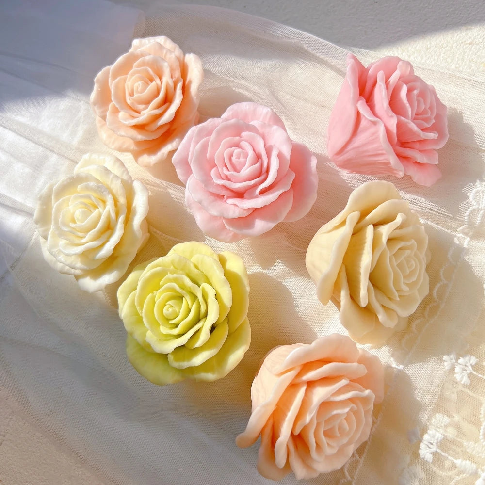 Overhead arrangement of pastel open rose castings