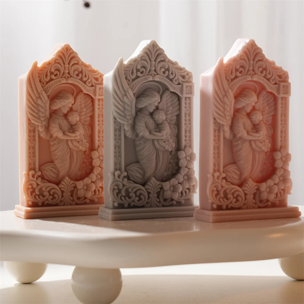 Angel relief castings with pointed ornamental frames