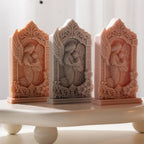 Angel relief castings with pointed ornamental frames