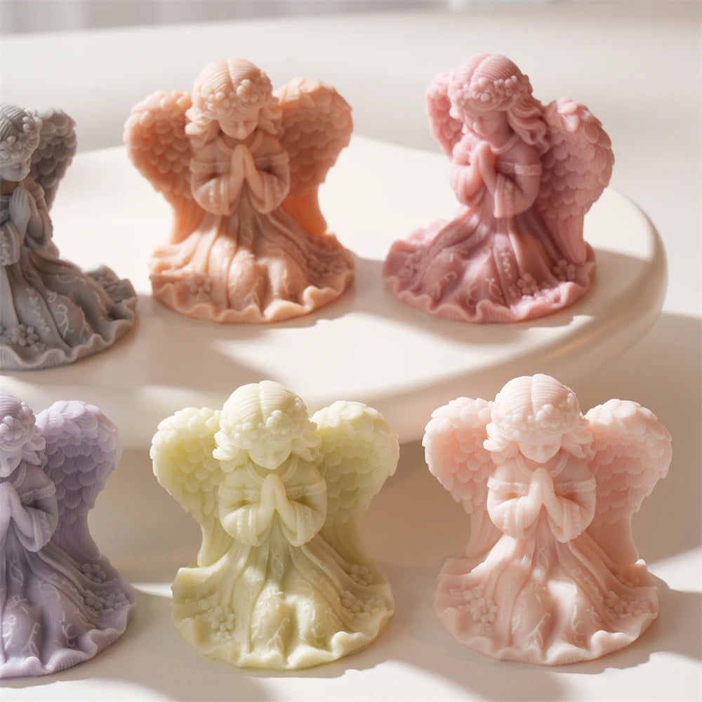 Praying angel girl figurines showing hair and clothing details