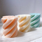 Peach, cream and teal rounded rope-twist candle castings