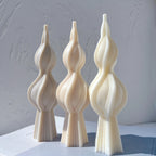 Cream and beige double-bulb spindle shapes viewed from the front
