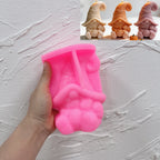 Pink silicone bat hat gnome with cat and pumpkin mold held open