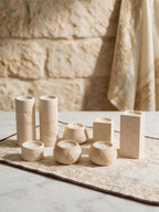 Selection of tall round and rectangular Hebrew-inspired decorative candle holders