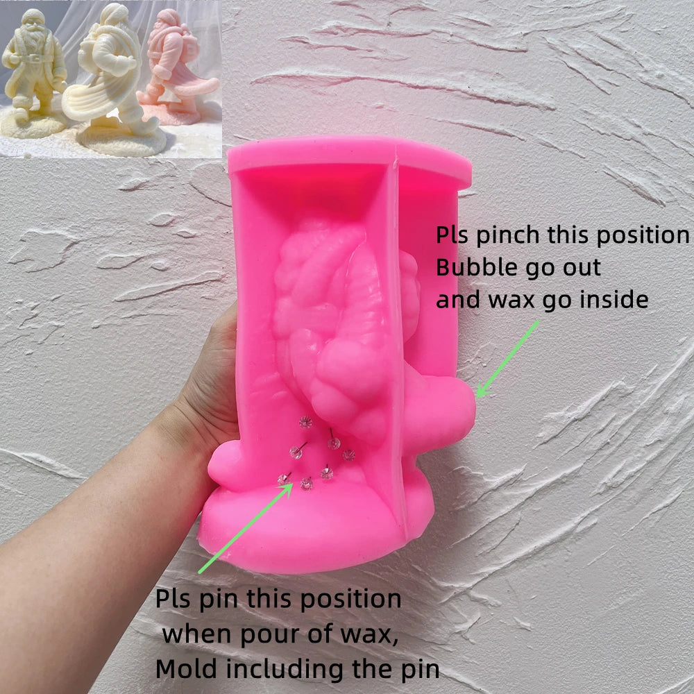 Pink walking Santa mold with marked pin placement and air-release guidance