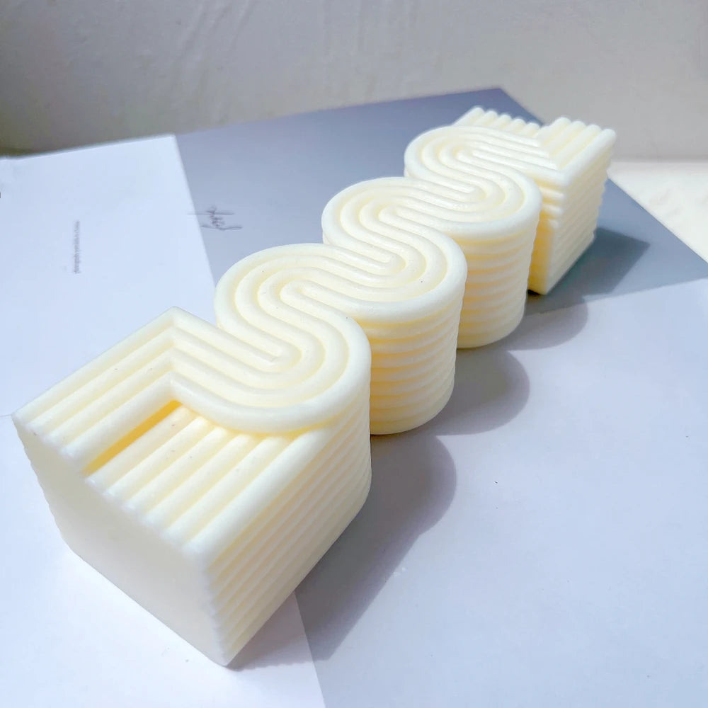 Angled top view of ribbed serpentine casting laid flat