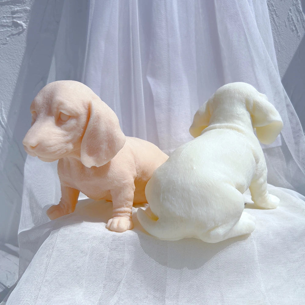 Side of peach puppy beside rear-facing cream casting