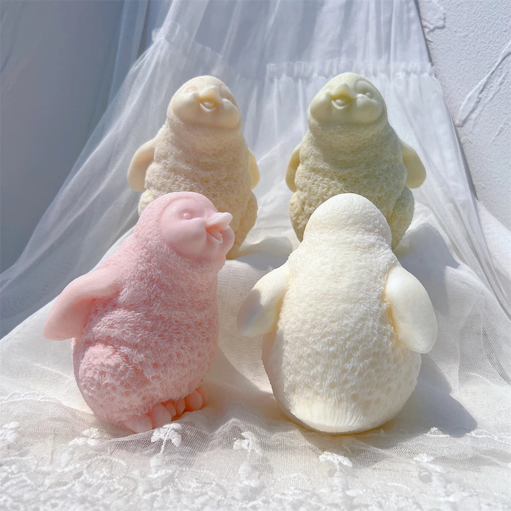 Front and rear views of fluffy penguin castings