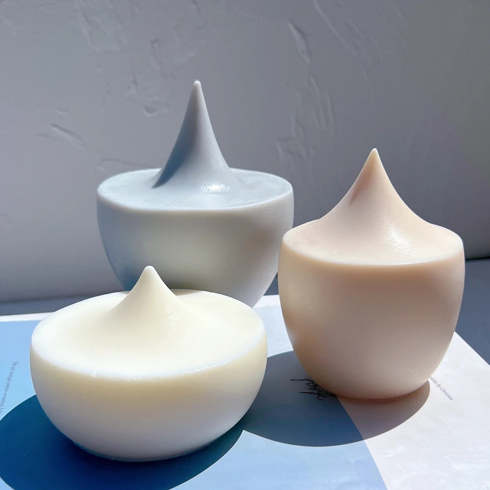 Rounded droplet candles with different tip proportions