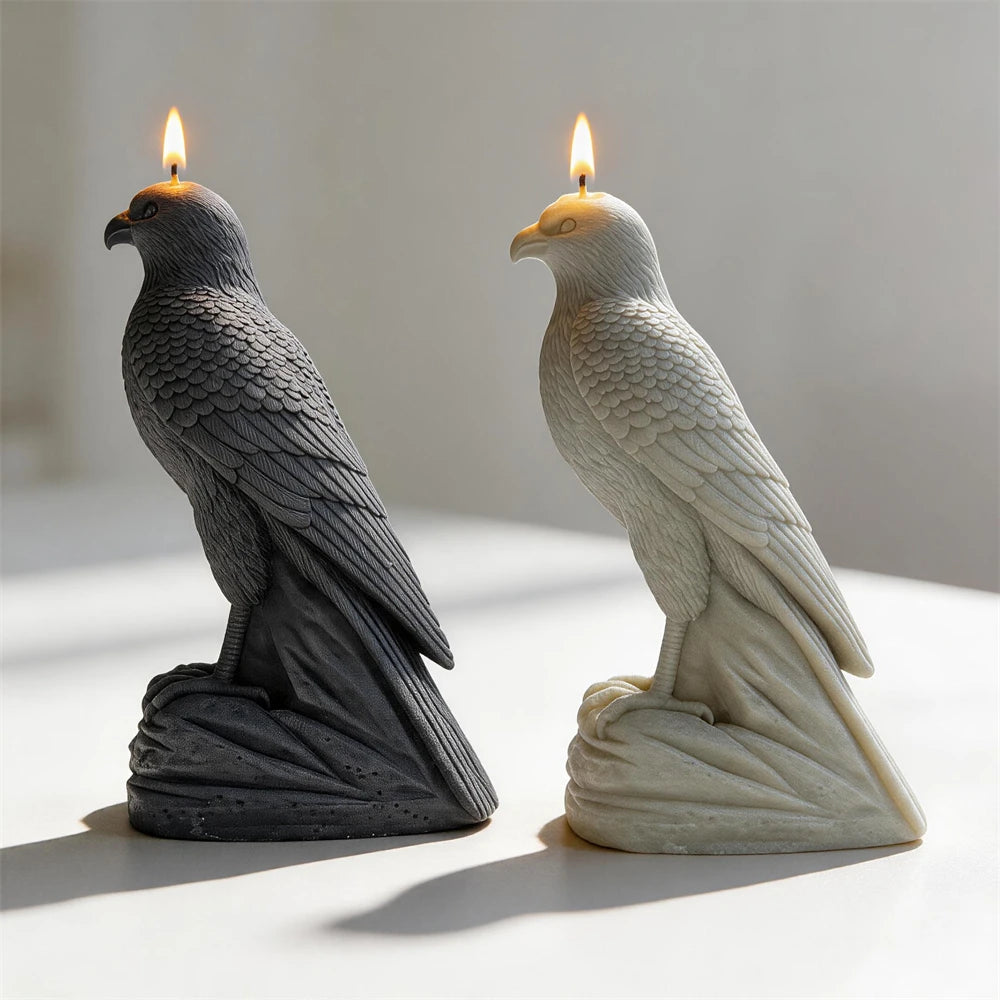 Side profiles of black and gray falcon castings with hooked beaks