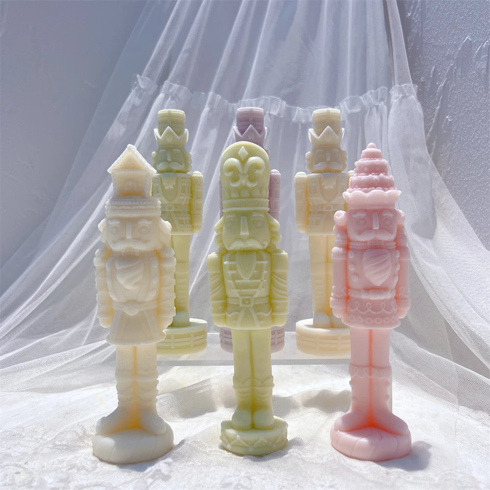 Pastel Christmas nutcrackers arranged in front and angled views
