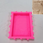 Pink silicone mold with rectangular recessed cavity for Hebrew inscription plaque