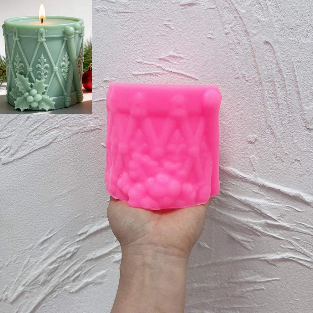 Pink silicone drum mold showing lacing and holly relief