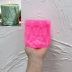 Pink silicone drum mold showing lacing and holly relief