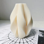 Ribbed wave casting displayed on a patterned surface