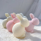 Side profiles of rounded crouching bunny castings
