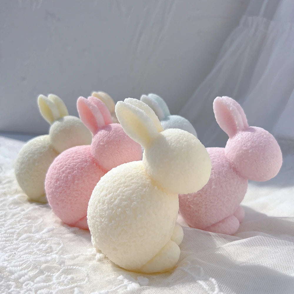 Side profiles of rounded crouching bunny castings