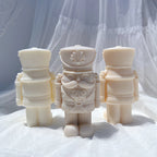 Rear views of nutcracker figures beside a front-facing soldier