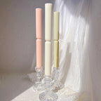 Three ribbed taper castings staged in glass holders