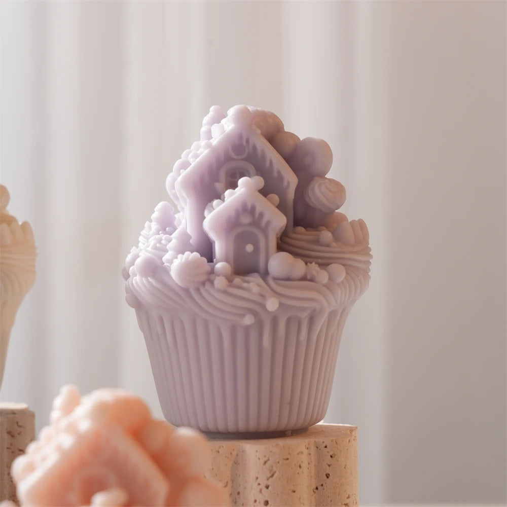 Purple snowy-house cupcake candle with layered roof detail
