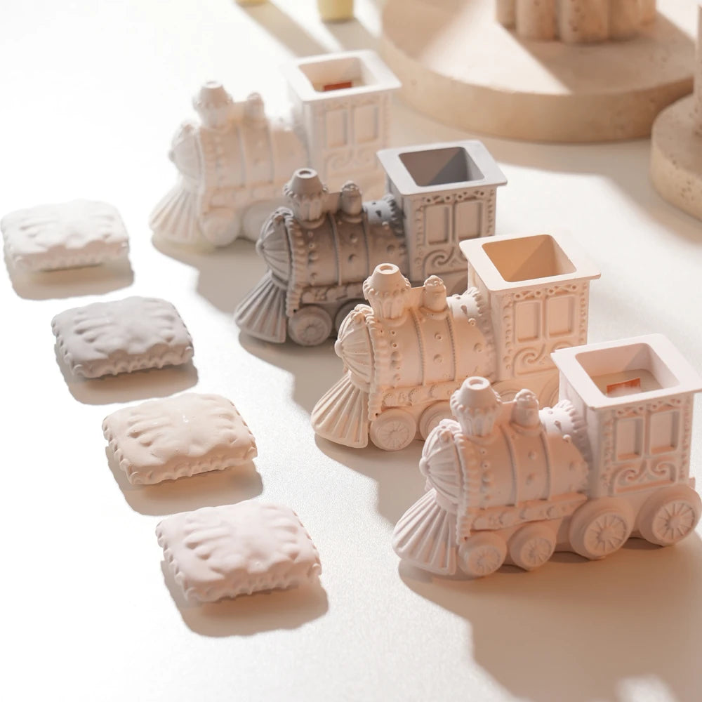 Four gingerbread train jars with separate matching lids
