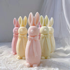 Tall bow-wearing rabbit castings with plush-like texture
